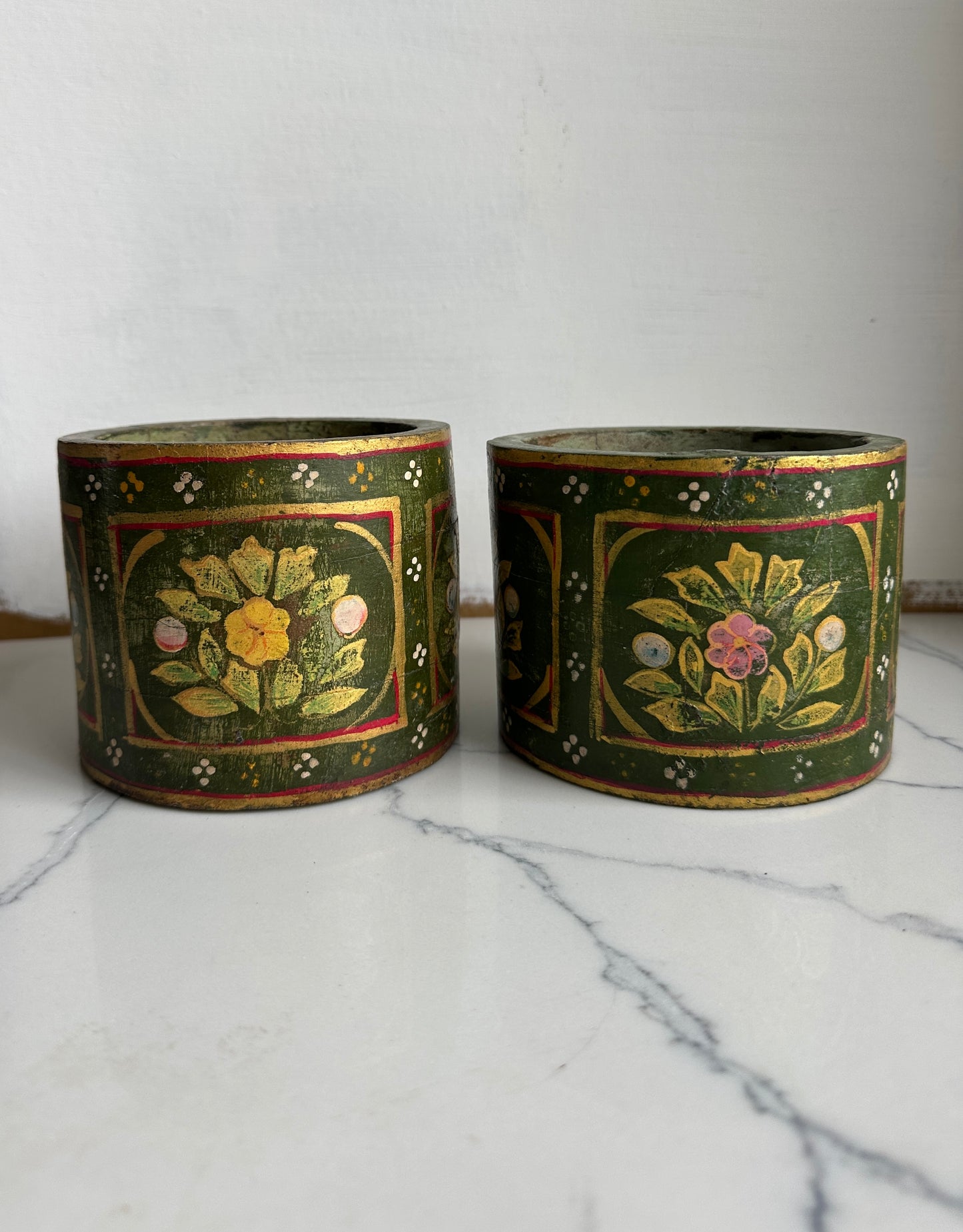Pair of green wooden holders