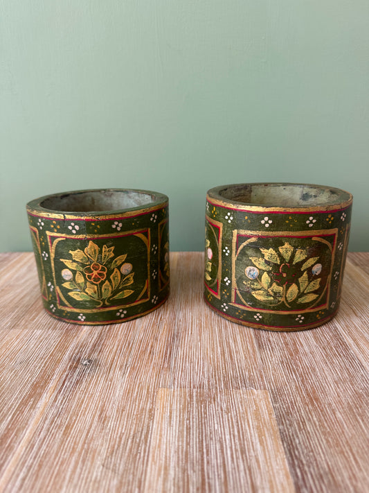 Pair of green wooden holders